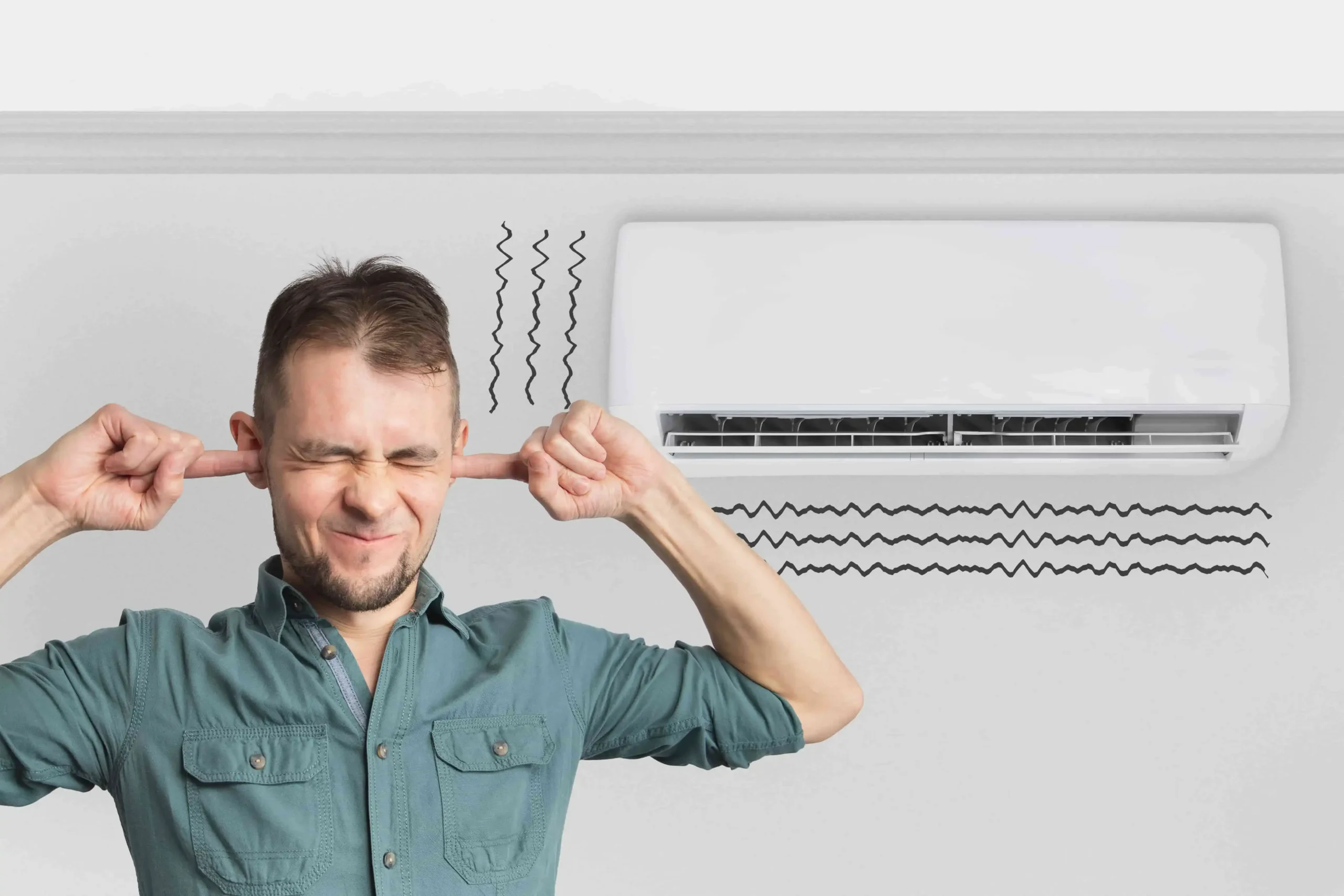 The air conditioner is broken - makes loud noises, noises and vibrations. Man covering his ears.