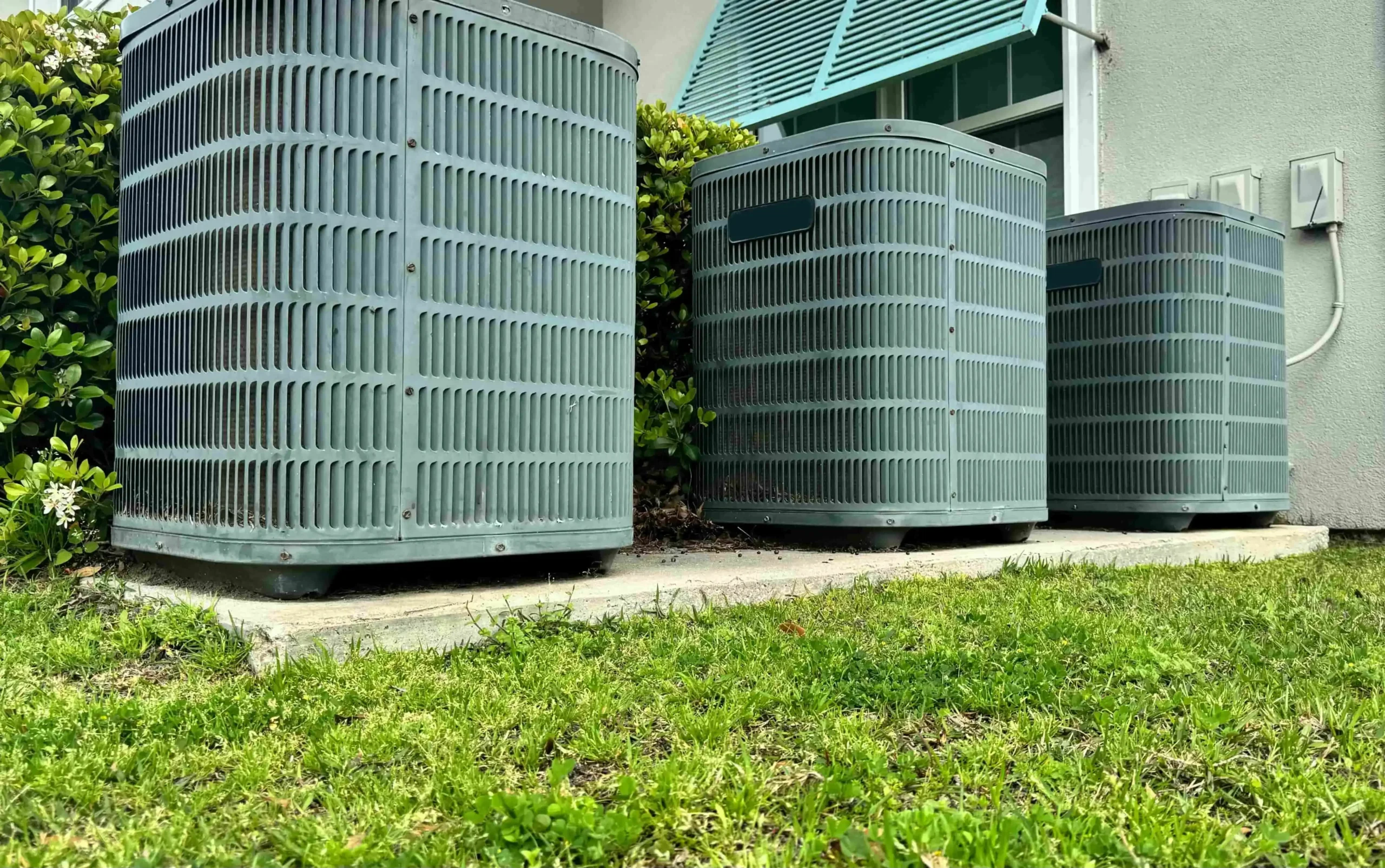 HVAC Air Conditioning Unit installed on a concrete slab with electrical box